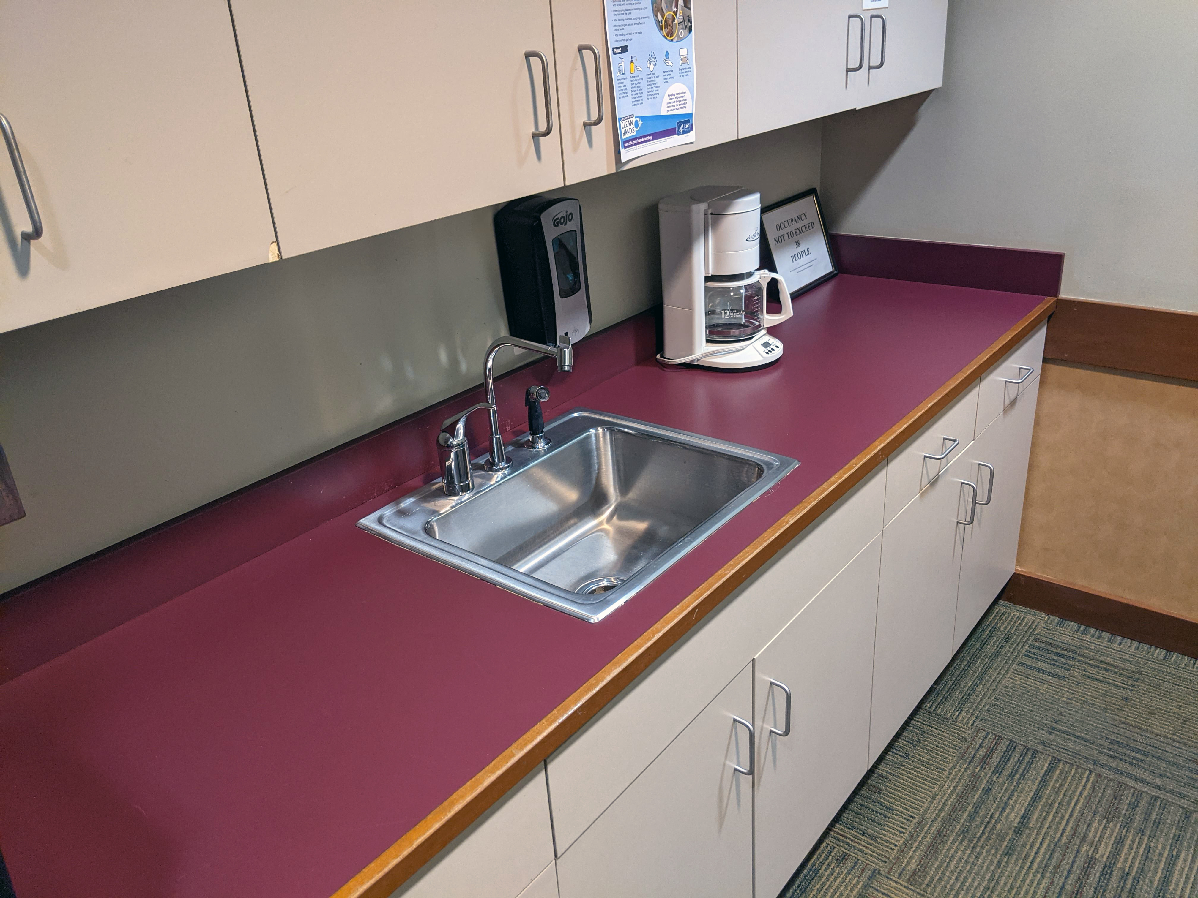A kitchenette is available with cupboard space.