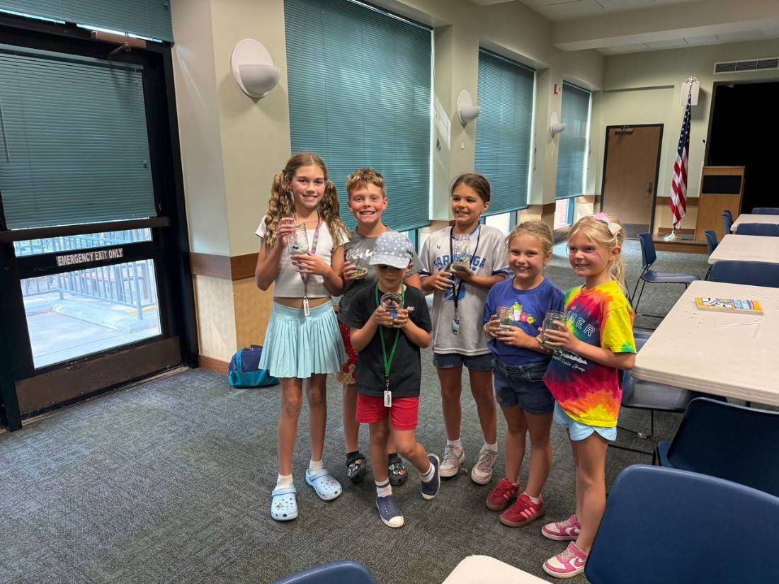 children show terrariums created at library program