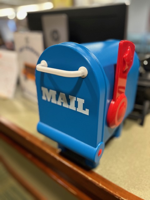 Toy mail box displayed at the children’s desk