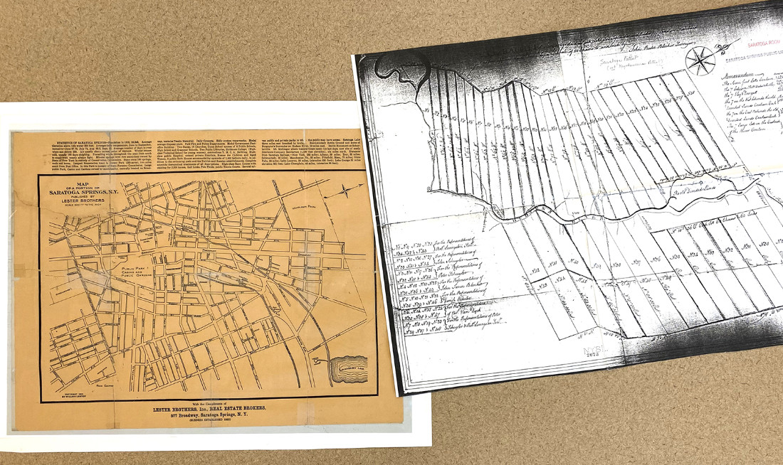 Two old area maps laid next to one another. One is brown, showing real estate. The other is darkened white showing a land survey.