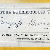 A label depicting a collection, title, and original publisher and photographer of a stereoscopic photograph.